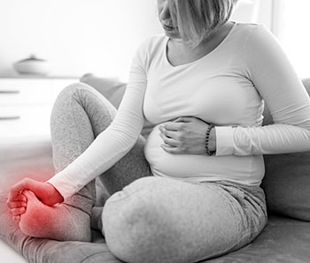 Pregnancy can cause heel pain, flat feet, and swollen feet. Also known as "pregnancy feet."