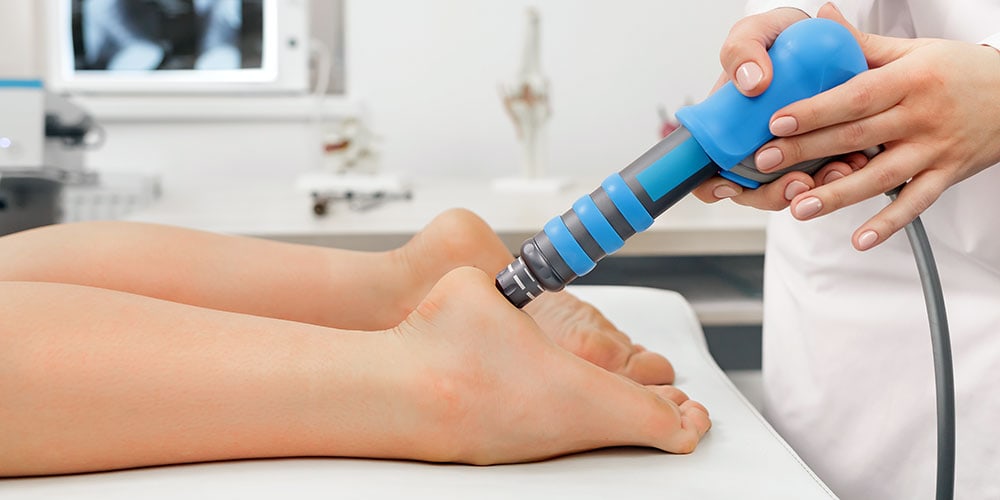 Ultrasound being applied to foot heel